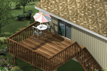 Raised wood patio deck has stairs to the ground level below and plenty of space for entertaining