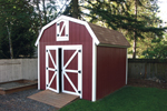 Yard barn with loft storage provides a couintry style charm that works great with a farmhouse style home plan
