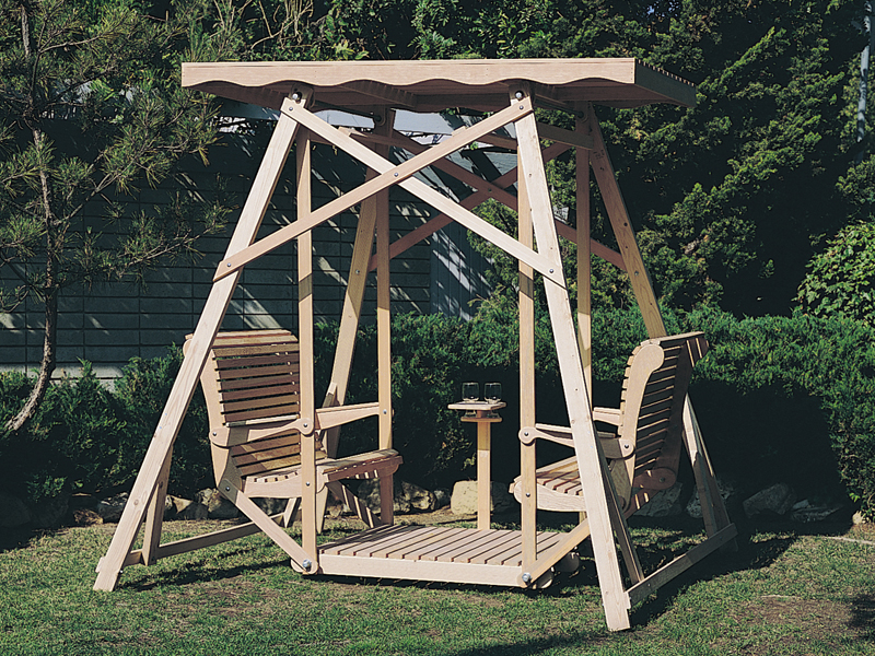Outdoor wood canopy glider swing is a great addition to a backyard
