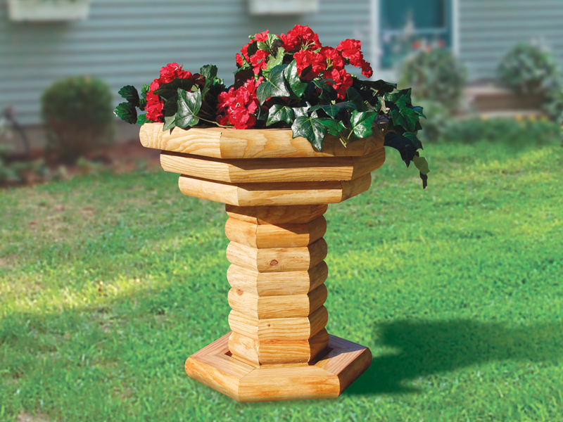 Landscape timber plant stand is a sturdy planter perfect for the front or backyard